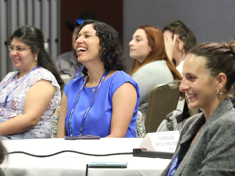 ASCP 2024 attendees smiling and looking towards speaker